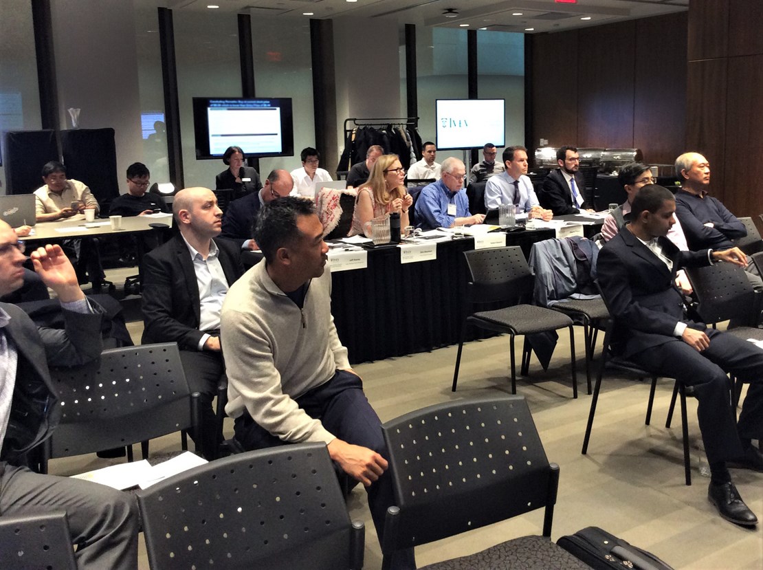 Panel of judges and audience watching Ivey