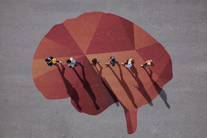 People Walking Over Creative Image Of Brain