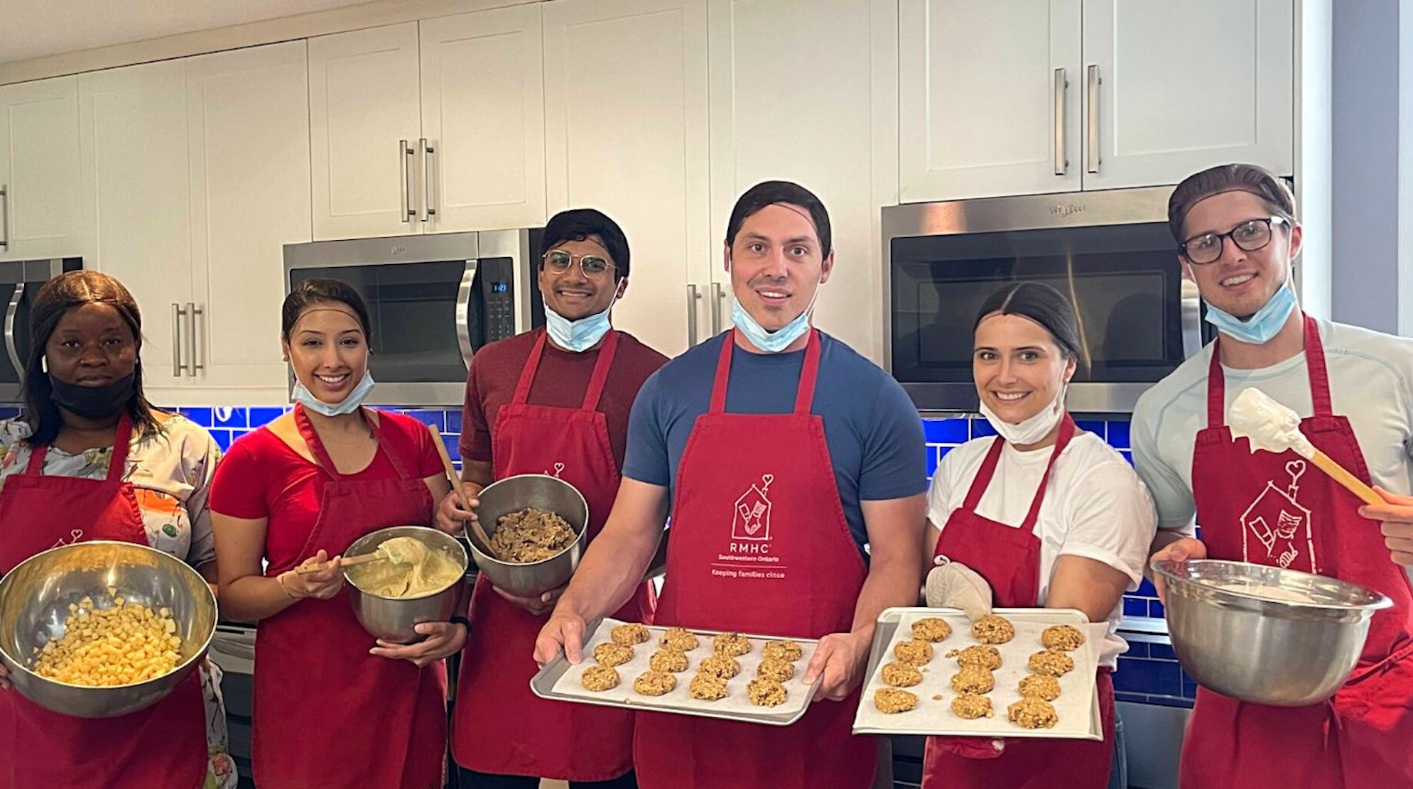 MBA students baking at the Ronald McDonald House