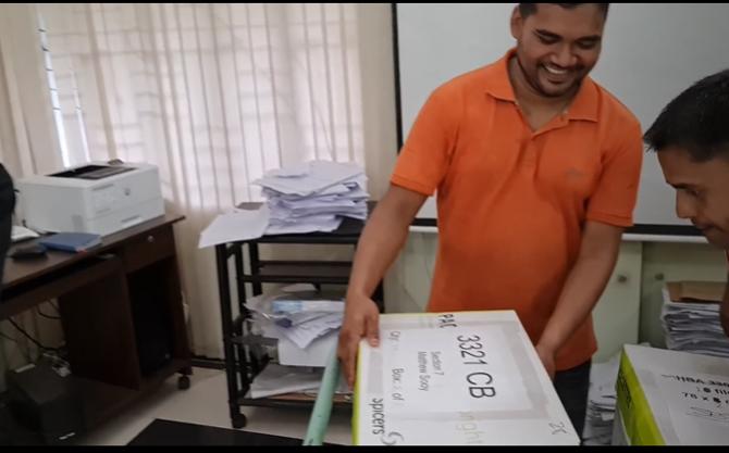 Volunteers Unpacking Shipment