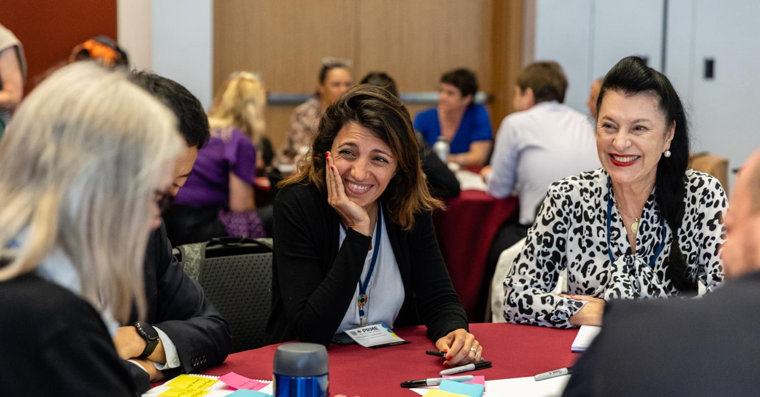 Workshop attendees discussing systems change