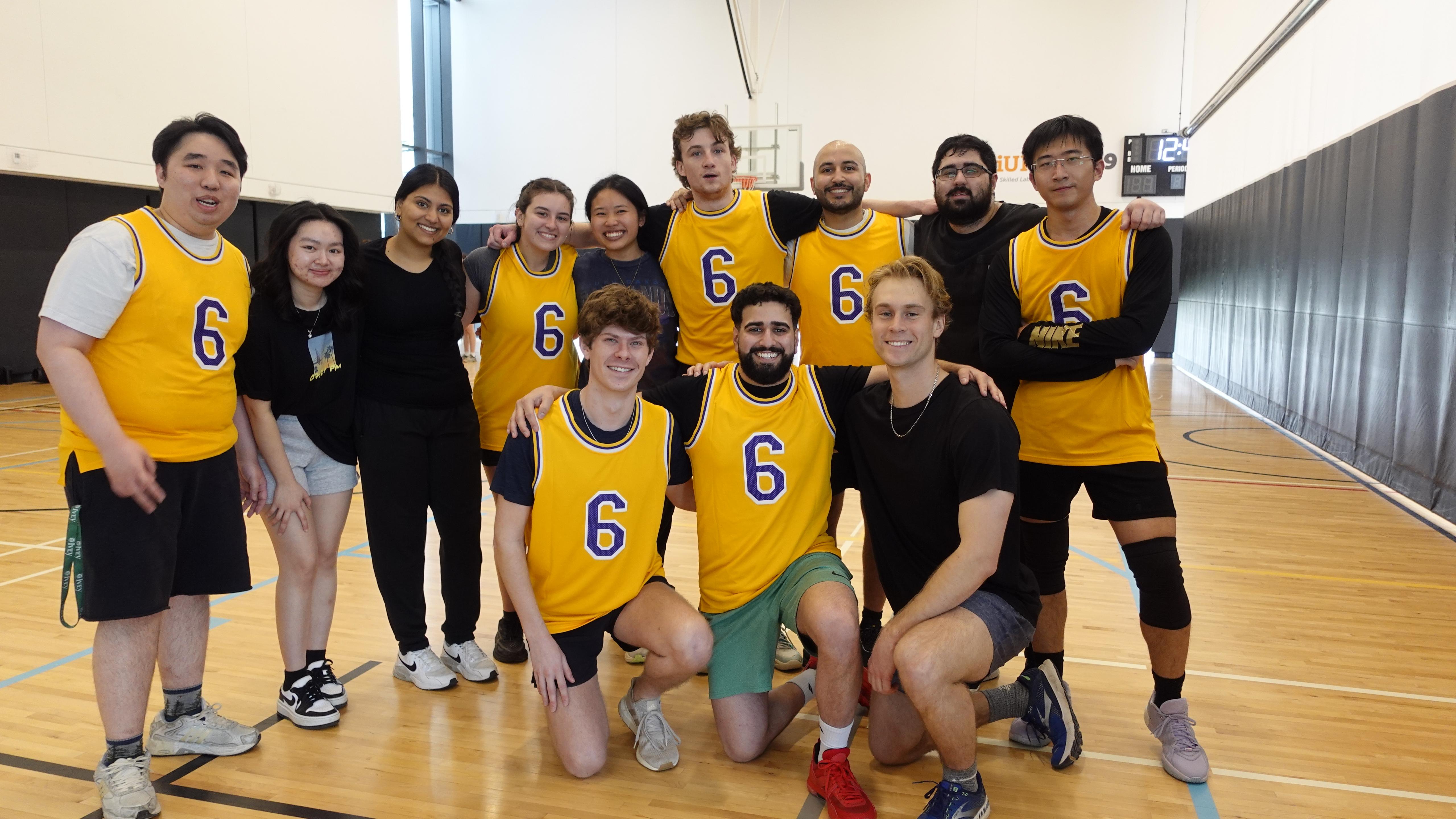 Picture of the BA stream team at the MScA basketball tournament. Pictured left to right (top row) Kuo's (Andre) Nguyen, Amanda Nguyen, Margi Patel, Lindsay Misener, Kelli Wang, Liam McCullagh, Hannan Anjum, Hamza Quadri, Tongxu Shen, (bottom row) Griffin Matheson, Akom Dhaliwal, Connor Childerhose
