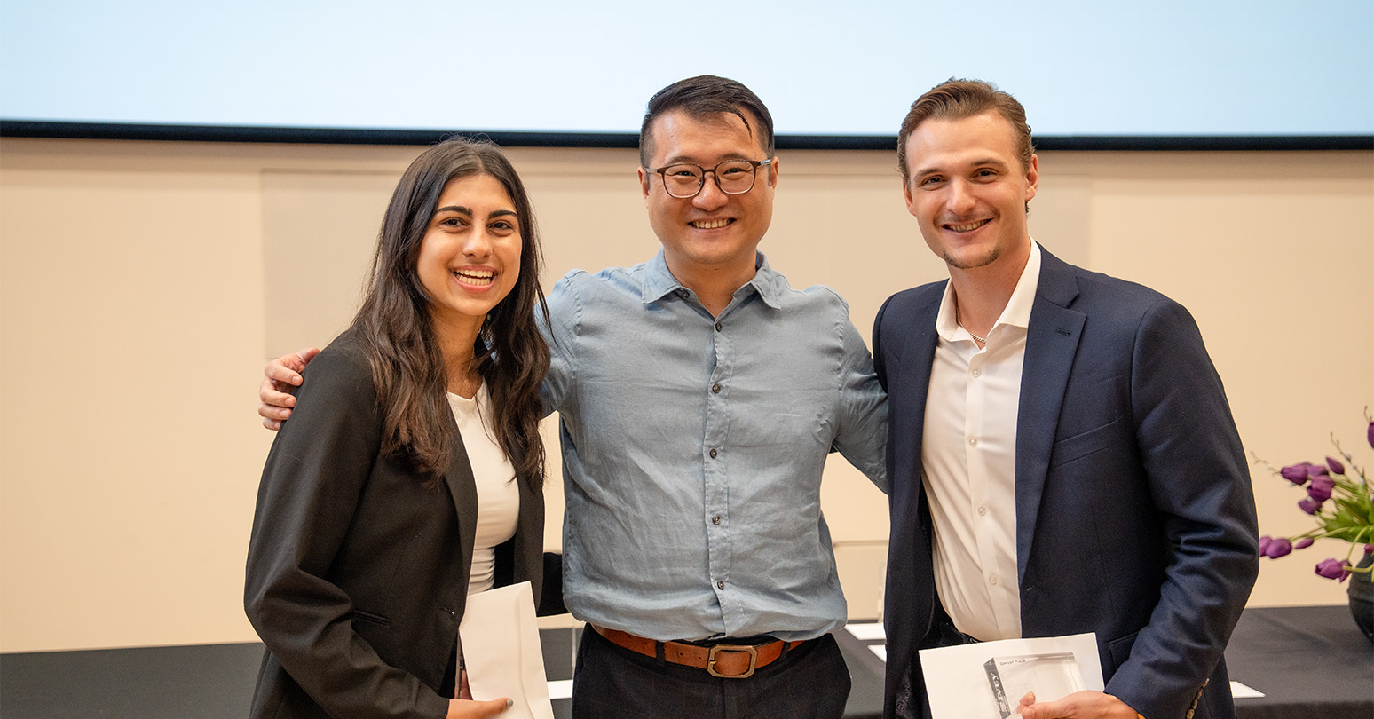 Faculty award winner Zhe Zhang with student award winners Sara Janmohamed and Spencer Proulx.