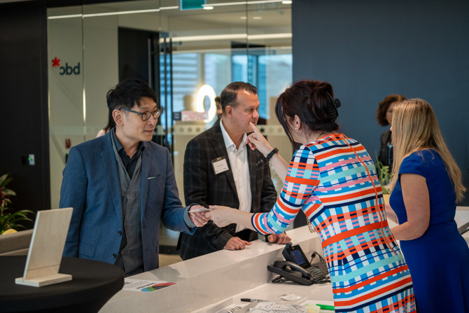 Attendees networking at the event