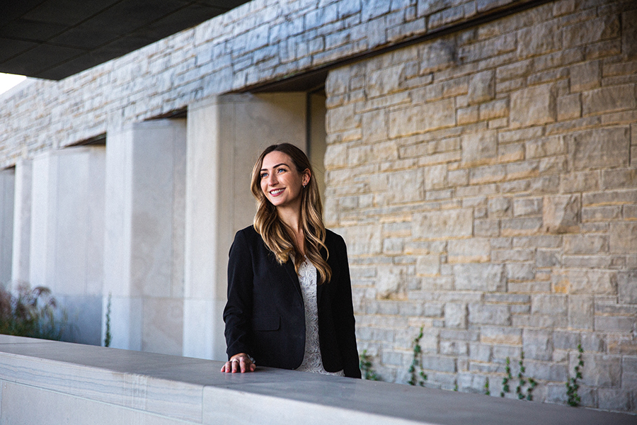 Ivey MBA student standing outside Ivey building in London ON